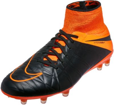 orange and black youth football cleats